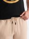 Ombre Męskie bawełniane spodnie joggery dresowe BASIC  beżowe V6 OM-PABS-0174 M 3