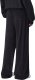 Champion Spodnie damskie Champion Parachute czarne 117432 KK001 L 2