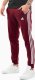 Adidas Spodnie męskie adidas Essentials Fleece 3-Stripes Tapered Cuff bordowe JG5951 S 1