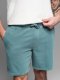 Męskie krótkie spodenki dresowe RELAXED FIT w stylu athleisure  turkusowe V1 OM-SRWS-0122 S 1