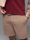 Krótkie spodenki męskie dresowe RELAXED FIT w stylu athleisure  jasnobrązowe V2 OM-SRWS-0122 M 1