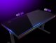 Dual-motor sit/stand adjustable-height gaming desk with wireless charger, RGB lighting, control panel, and USB ports, solid tempered glass tabletop, black. 2