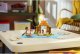 LEGO Disney Vaiana 2 Wiejska chatka i łódź (43282) 9