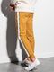 Ombre Spodnie męskie dresowe joggery P951 - musztardowe XL 4